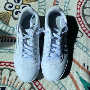 White leather Puma tennis inspired sneakers